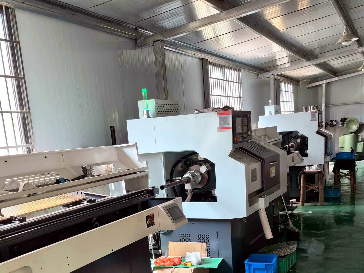 CNC turning equipment in a partner production environment.